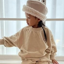 Veloure Smiley Sweater – Kuschelkomfort trifft lässigen Style