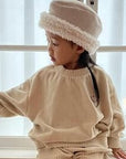 Veloure Smiley Sweater – Kuschelkomfort trifft lässigen Style