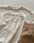 Bakery Club Sweater – Lässiger Print für kleine Genießer