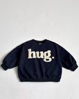 Hug Embossed Sweatshirt – Statement-Piece mit fühlbarem Print