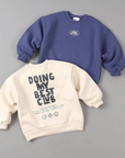 Doing My Best Club Sweatshirt – Lässiger Komfort mit Botschaft
