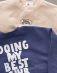 Doing My Best Club Sweatshirt – Lässiger Komfort mit Botschaft