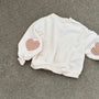 Heart Patch Sweatshirt – Oversize Pullover mit Detail