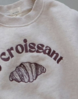 Le Croissant Sweatshirt – Französischer Charme für jeden Tag