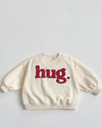 Hug Embossed Sweatshirt – Statement-Piece mit fühlbarem Print