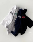 Black Button Logo Tee