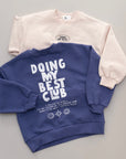 Doing My Best Club Sweatshirt – Lässiger Komfort mit Botschaft