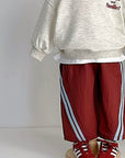 Stripe Track Pants – Weite Hose mit sportlichem Detail